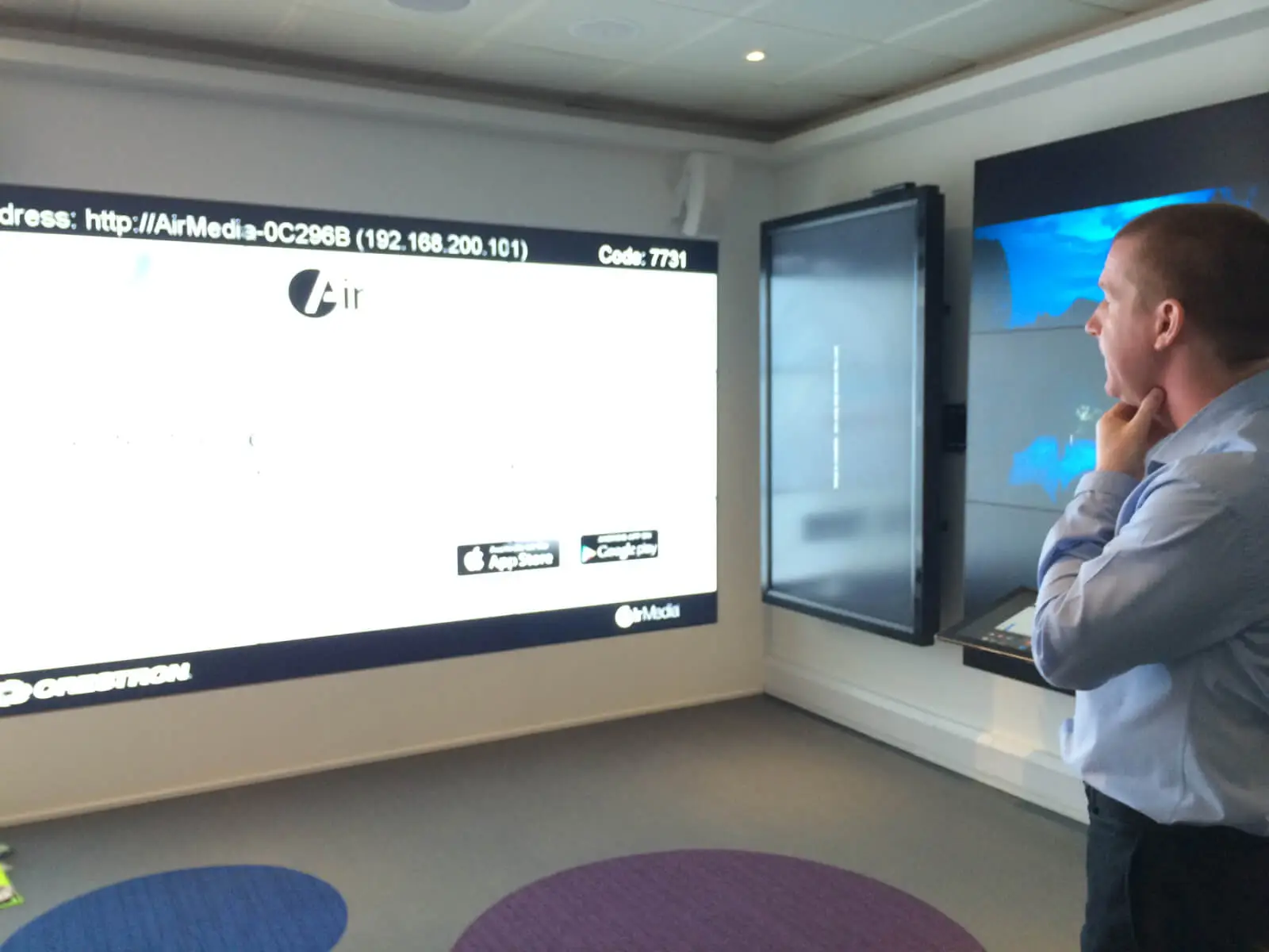 PEL UK Offices space with designer furniture and wall mounted digital screens 12